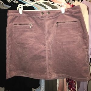 Light purple skirt with cute buttons and zippers!